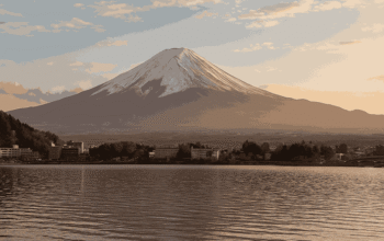 Mount Fuji in Autumn Sunrise with Vibrant Red Maple Trees and Clear Skies – Budget Travel Japan 2025